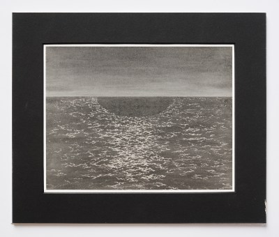 A black-and-white image of an ocean.